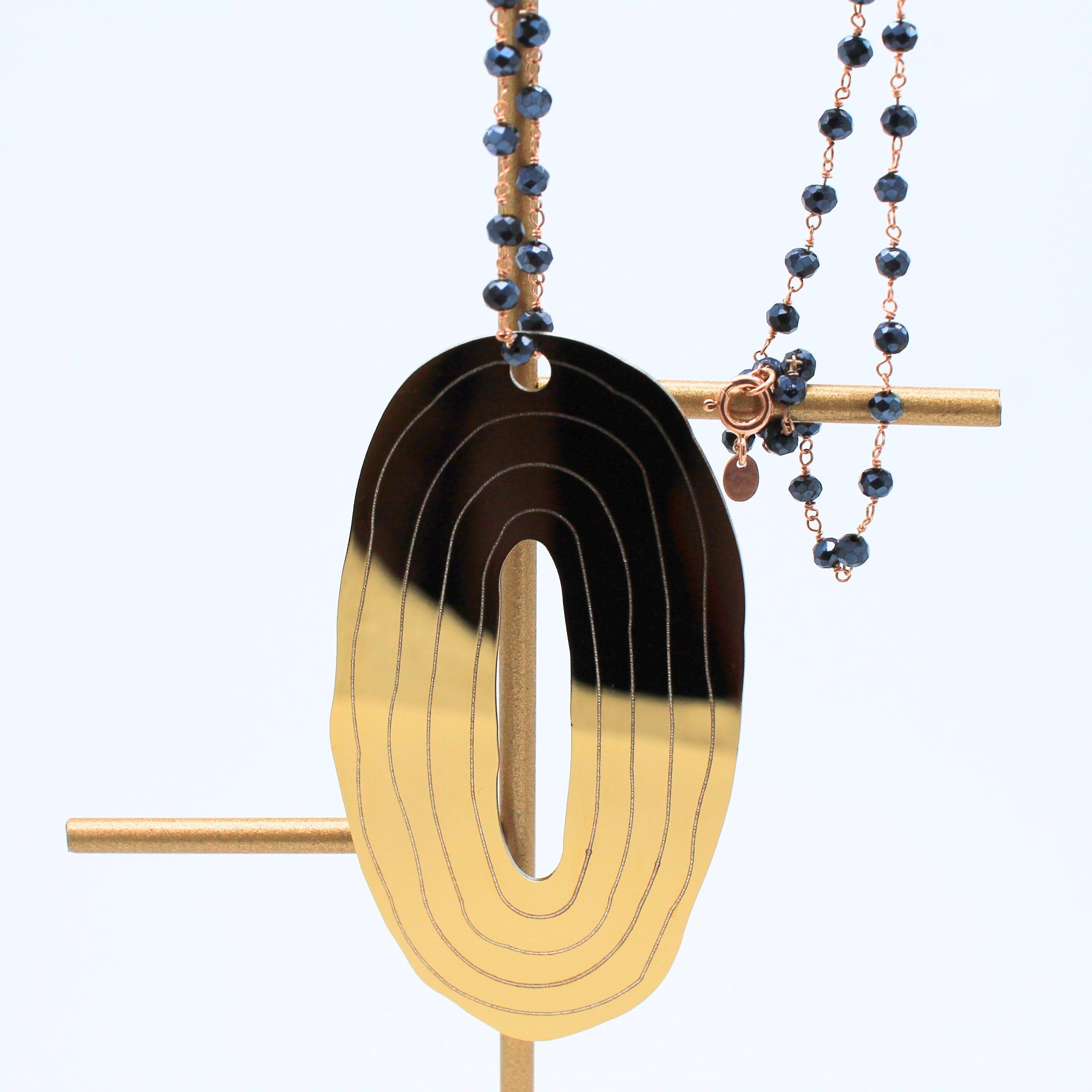 Ciondolo gold acciaio