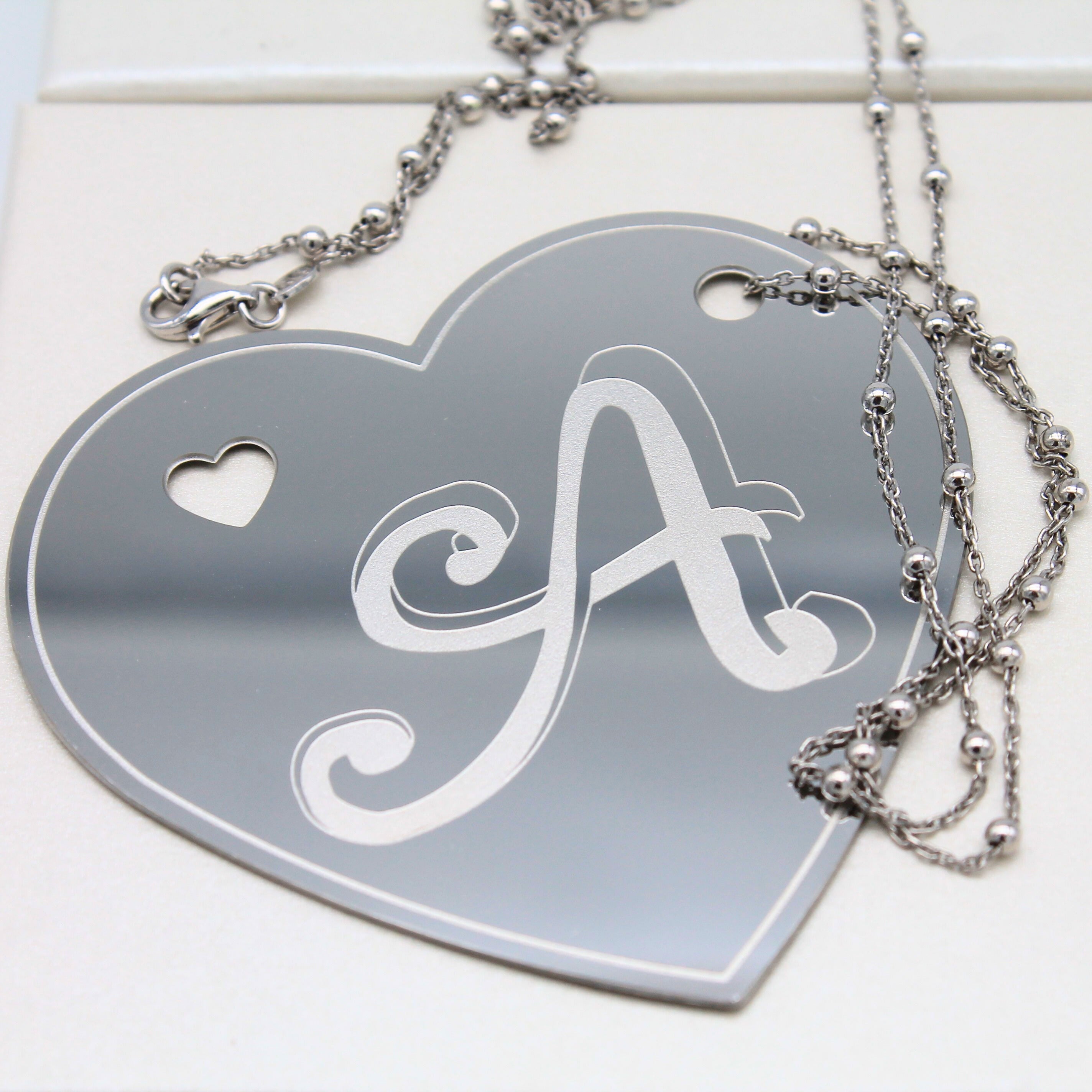 Collana ciondolo inciso acciaio inox