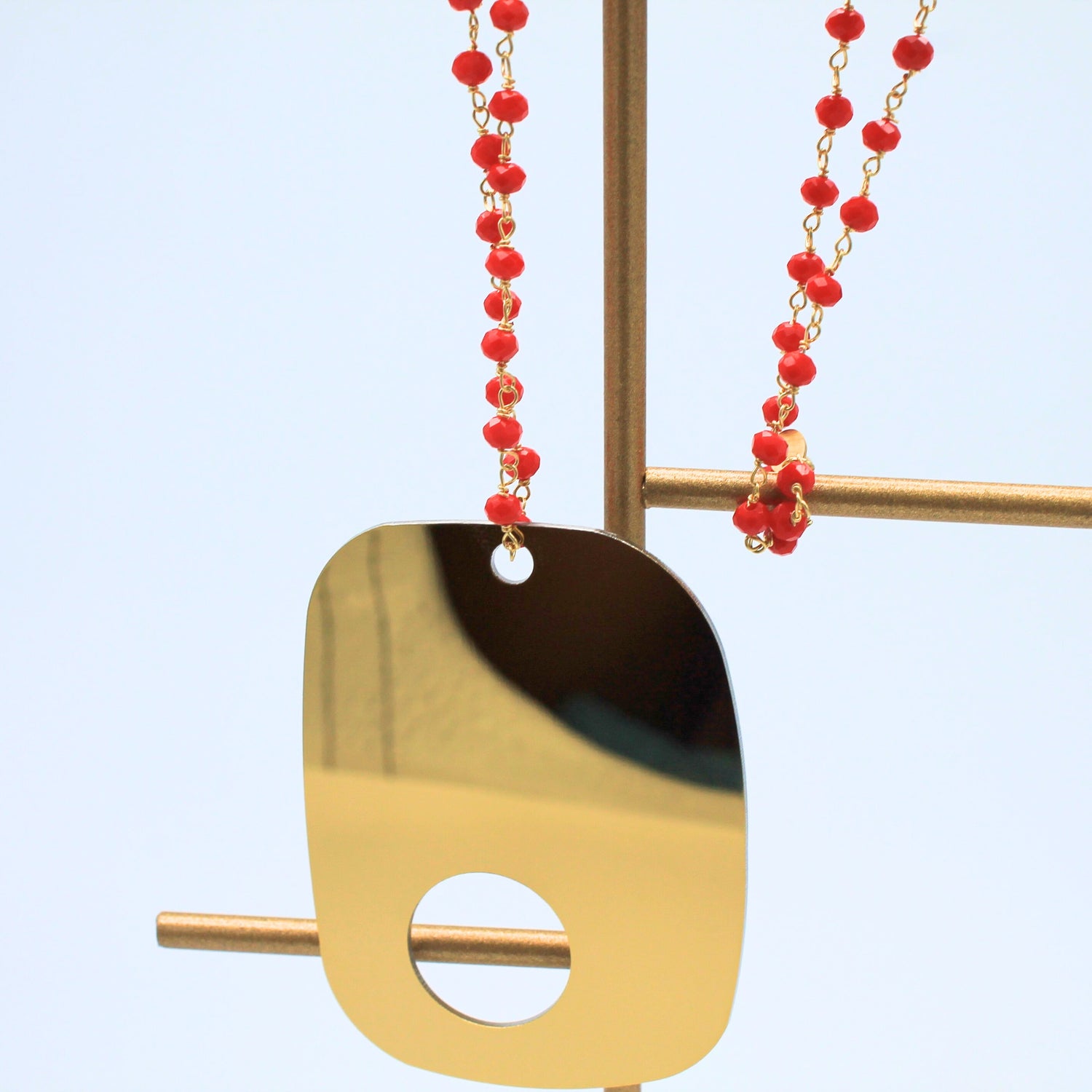 Ciondolo acciaio gold elisir