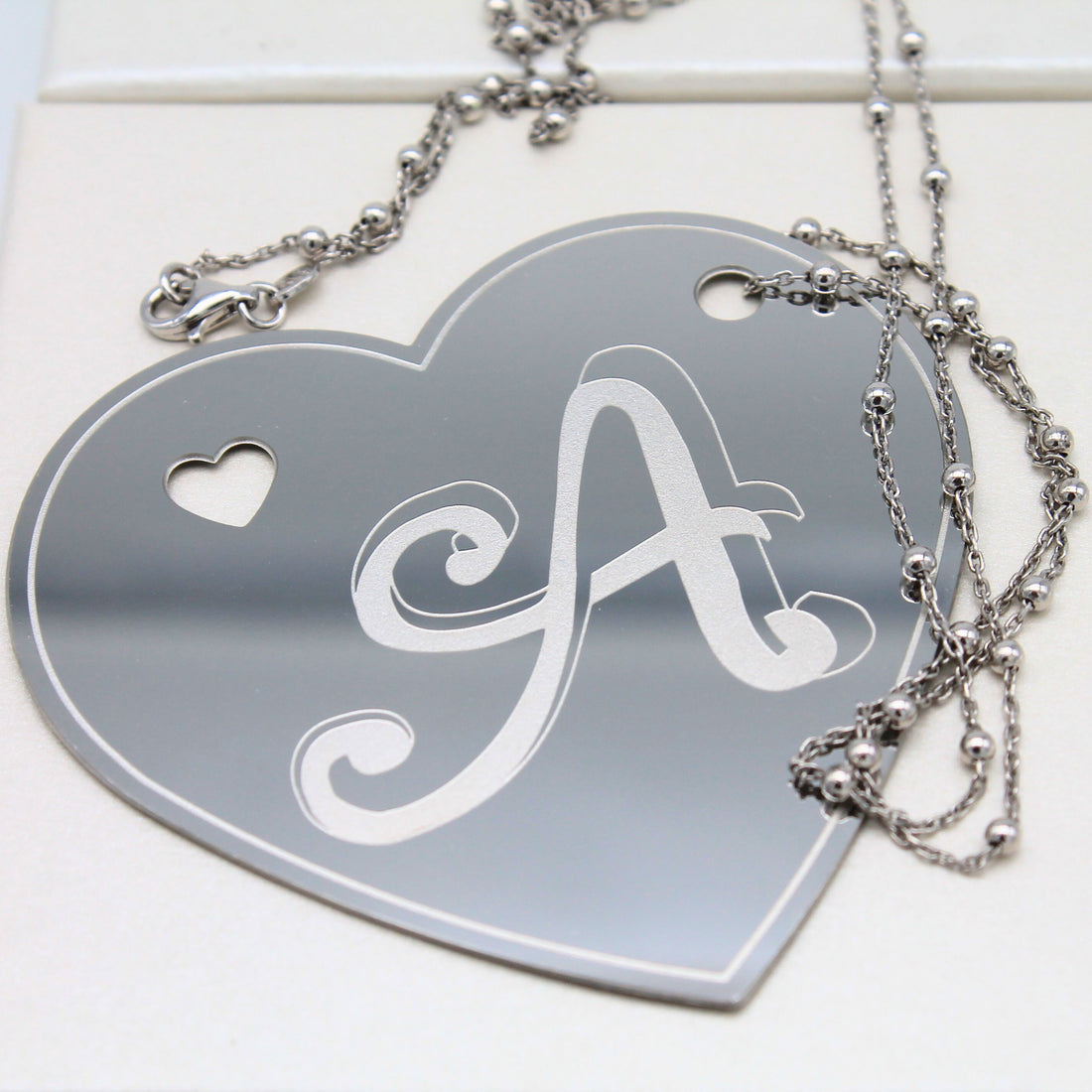 Collana ciondolo inciso acciaio inox