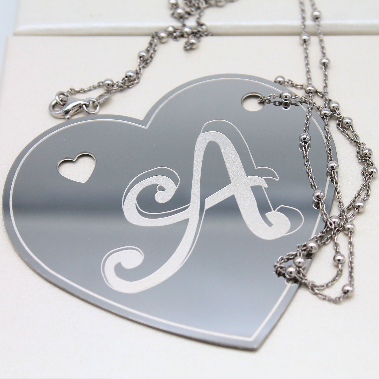 Collana ciondolo inciso acciaio inox